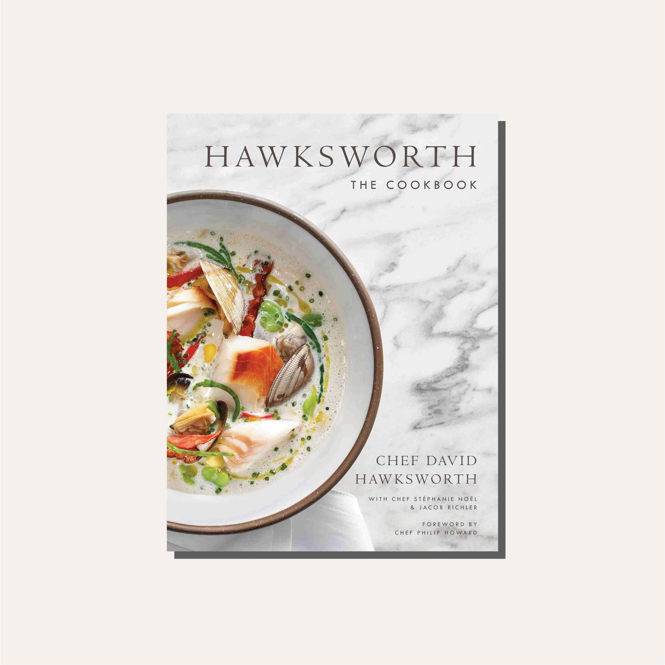 A cookbook cover in a light frame