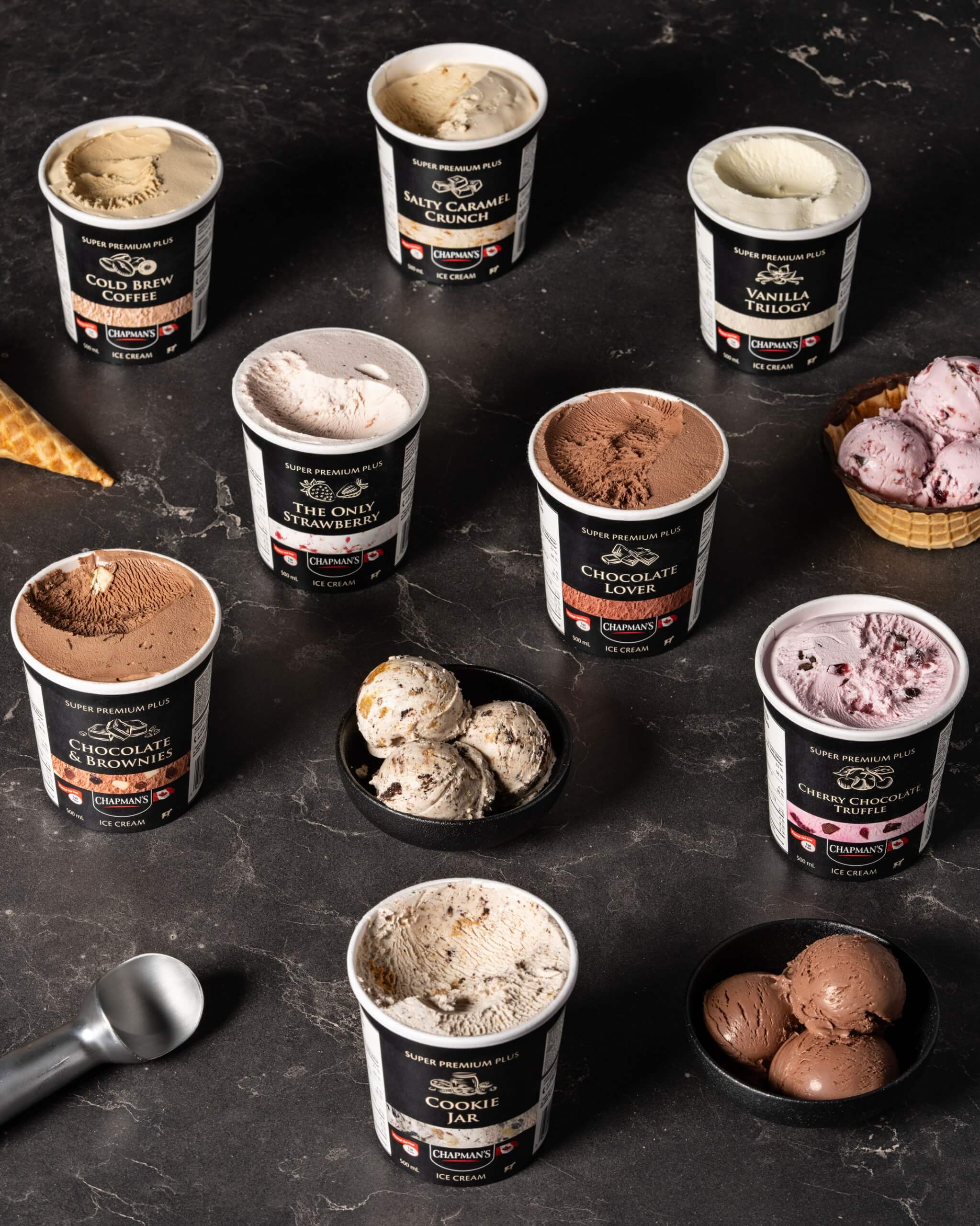 Open containers of Ice Cream on black background