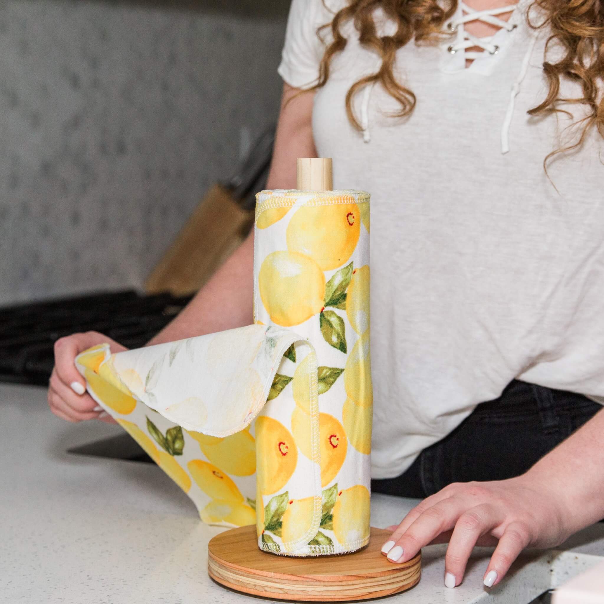A woman using reusable paper towels.