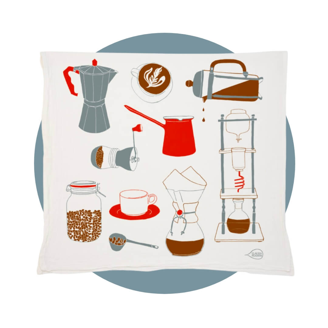 A white tea towel with illustrations of different coffee tools on a blue circle graphic.