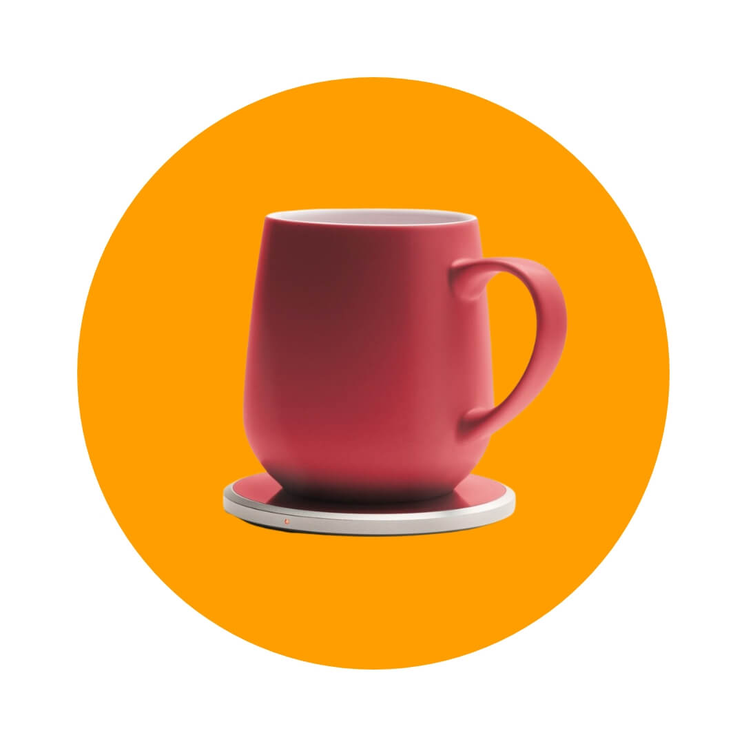 A red mug sitting on a matching circular base on an orange circle graphic.