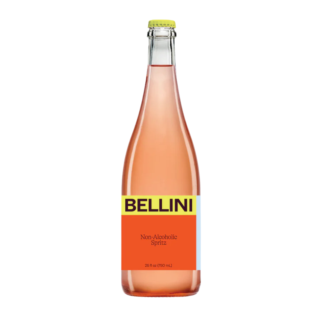 Clear bottle of light orange non-alcoholic bellini. 