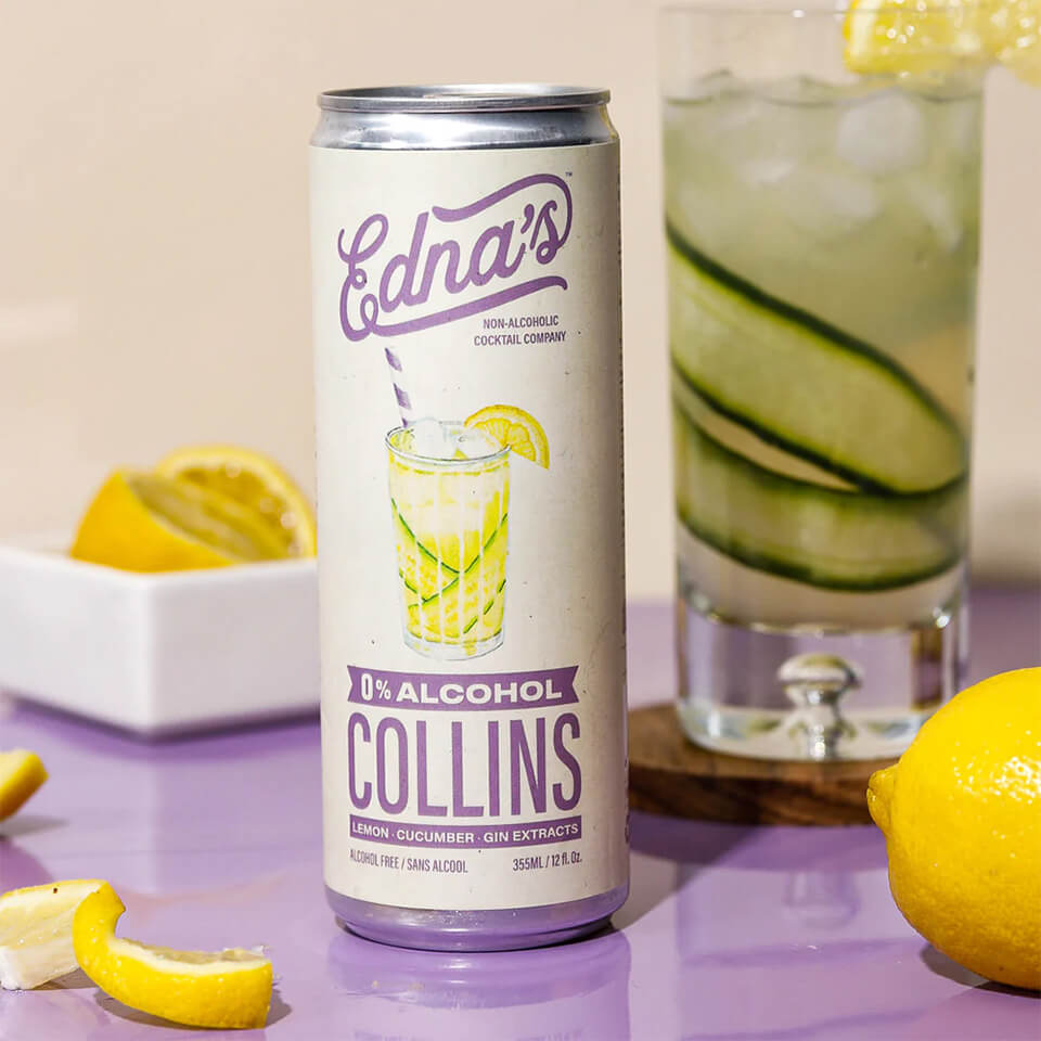 A purple and cream-coloured can on a purple tile surface