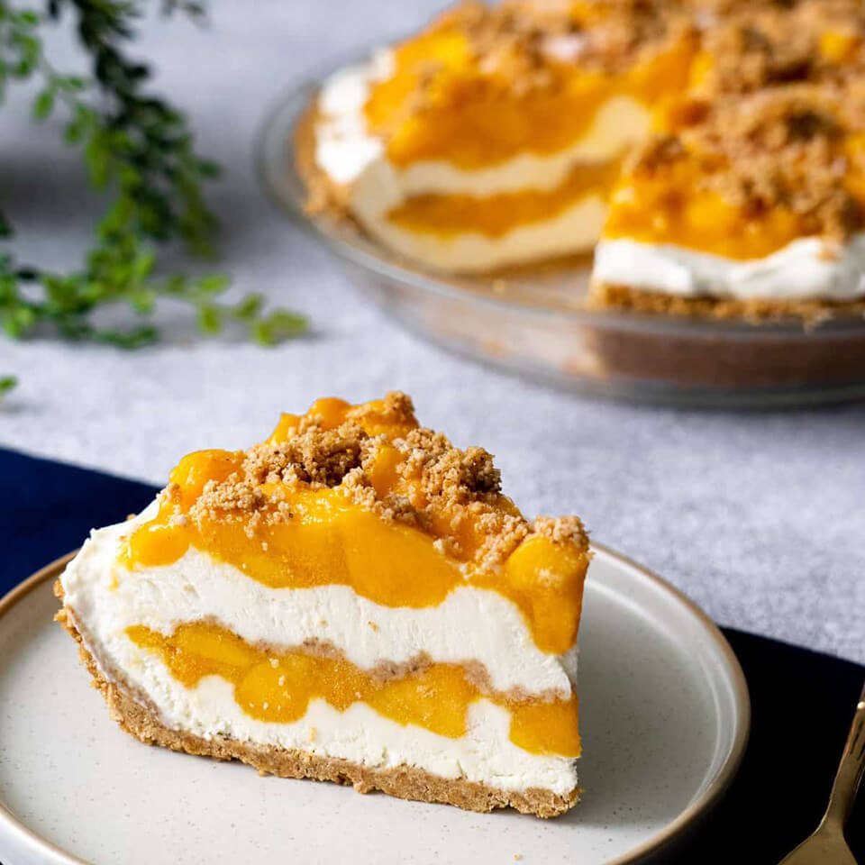 This Mango Royale recipe is a version of a mango float recipes with thick layers of cream, chunks of mango and graham cracker crust mangoes.