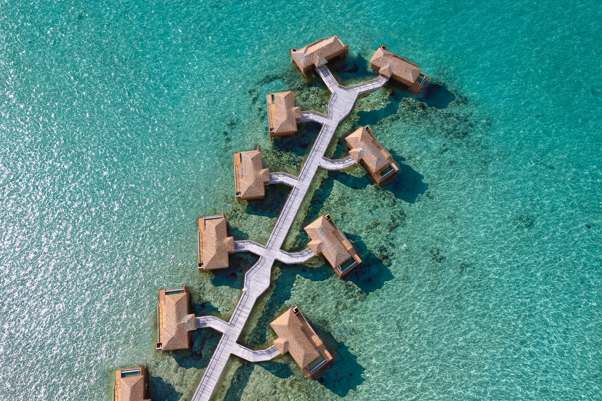 aerial view of oversea stunning water villa over Caribbean seas at the Princess Senses in Jamaica