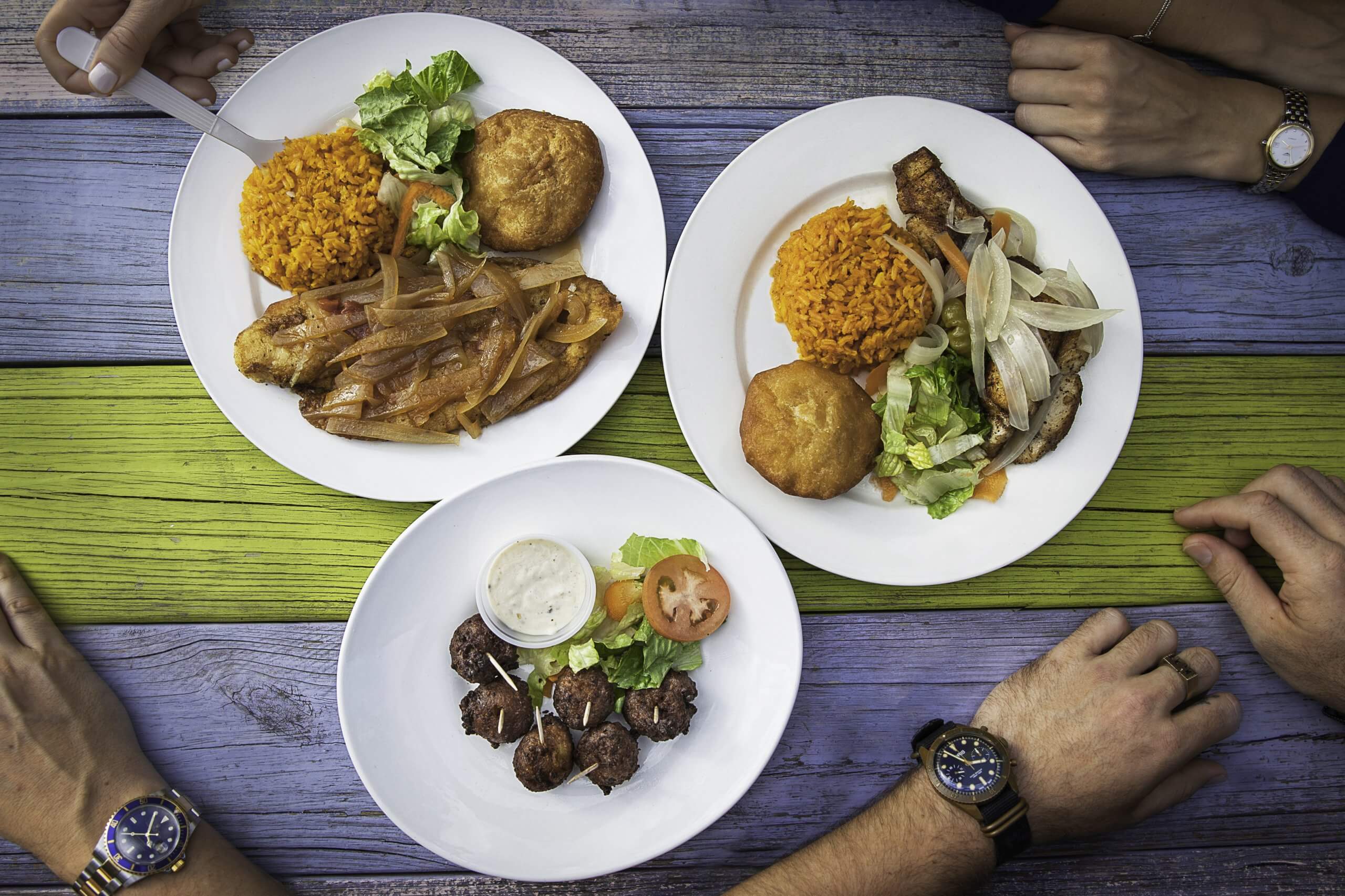 Three dishes of food shot overhead