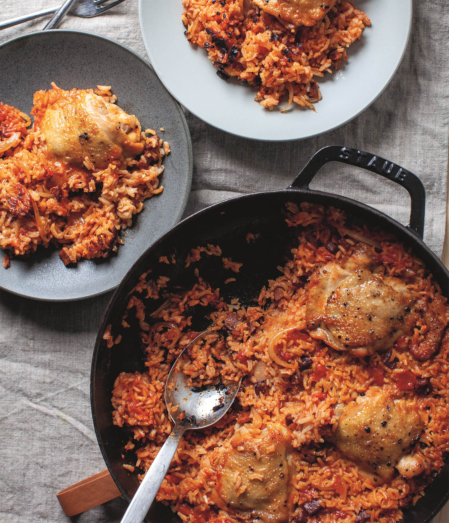 A pan with easy recipe for a rice, chorizo and chicken thighs