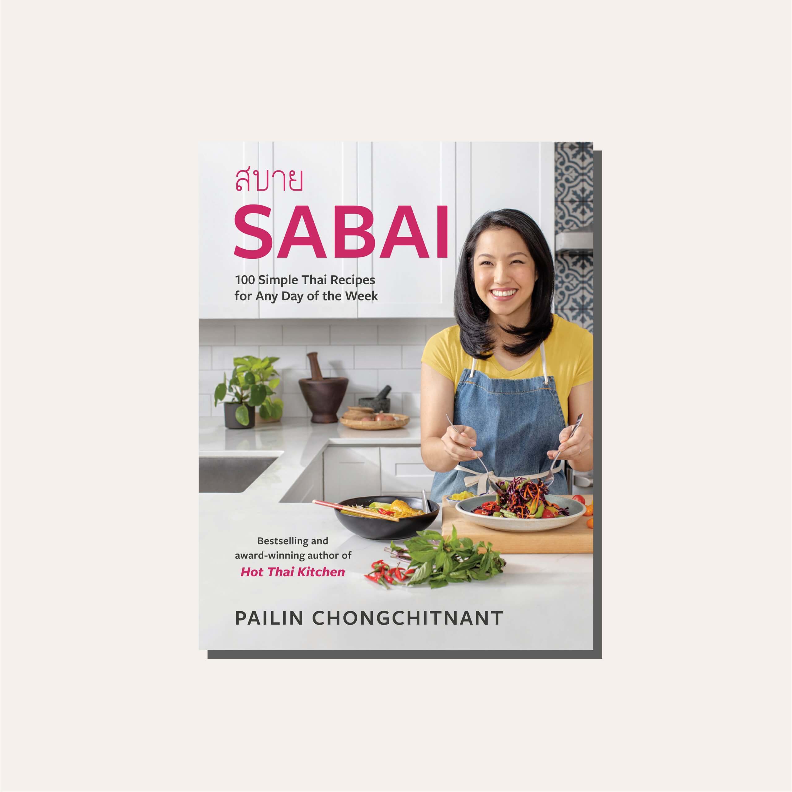 A cookbook cover in a light frame
