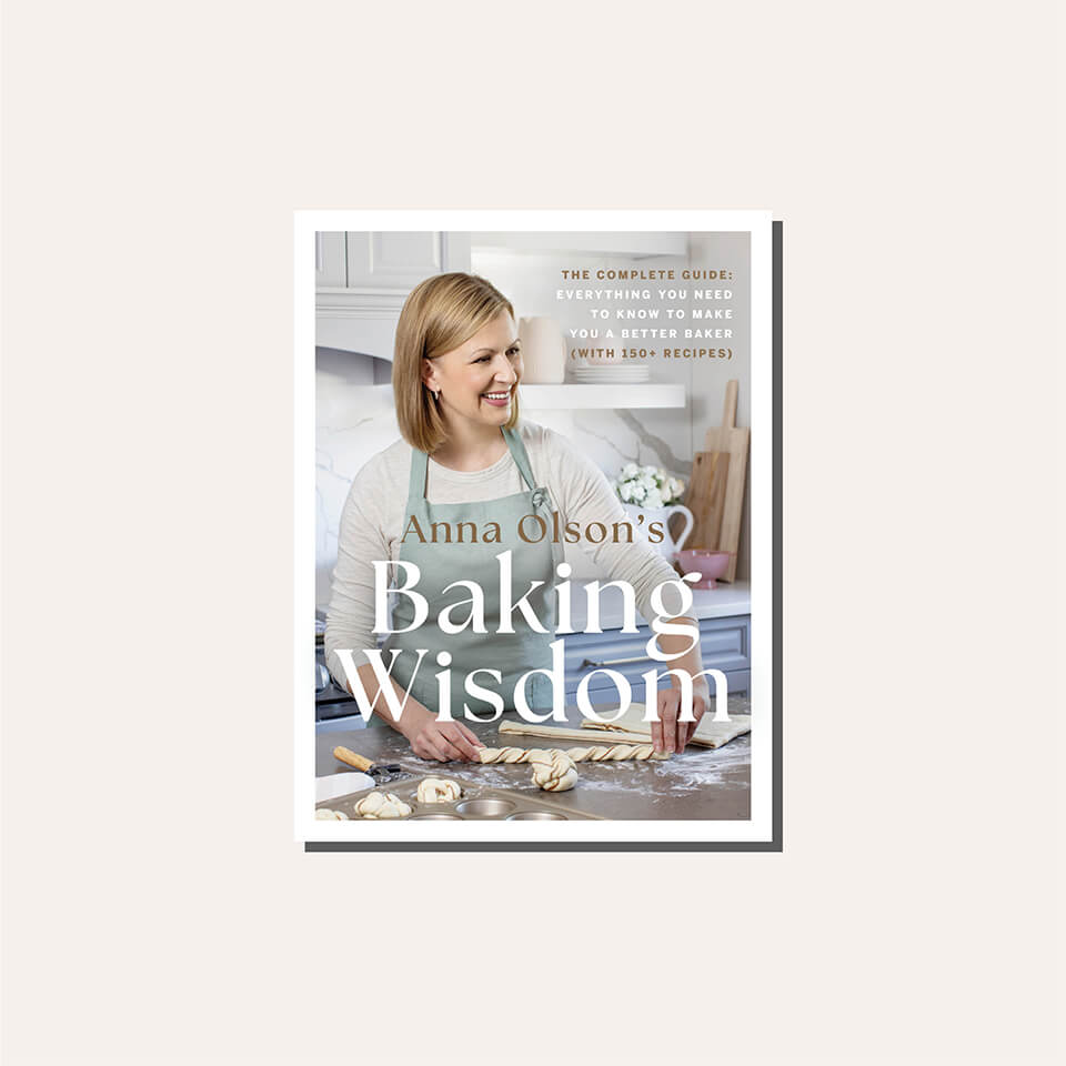 A cookbook cover in a light tan frame
