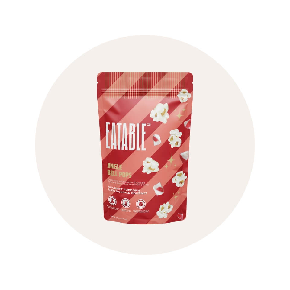A red and pink striped package of Eatable jingle pops in a pink circle